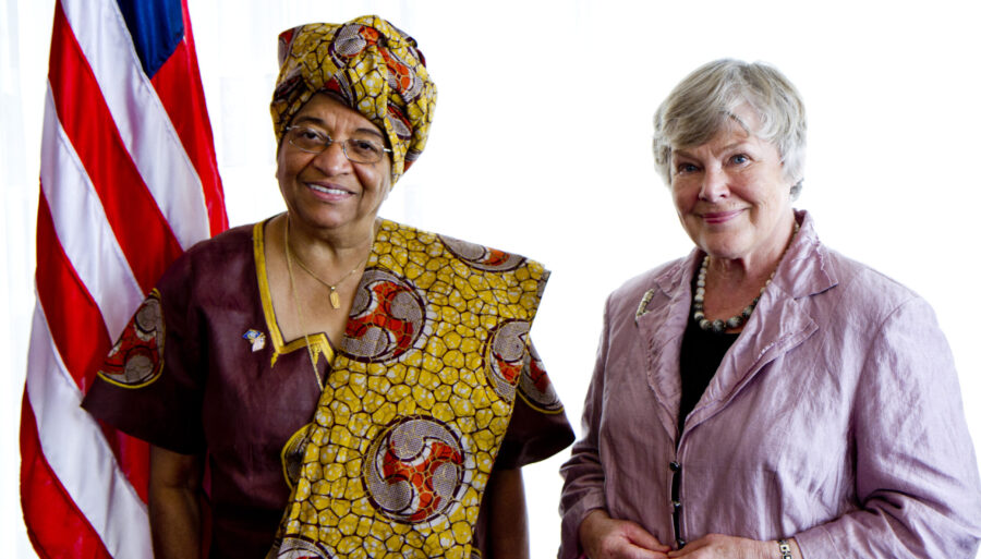 Elisabeth Rehn of Finland and Ellen Johnson Sirleaf of Liberia standing side by side, looking at the camera.