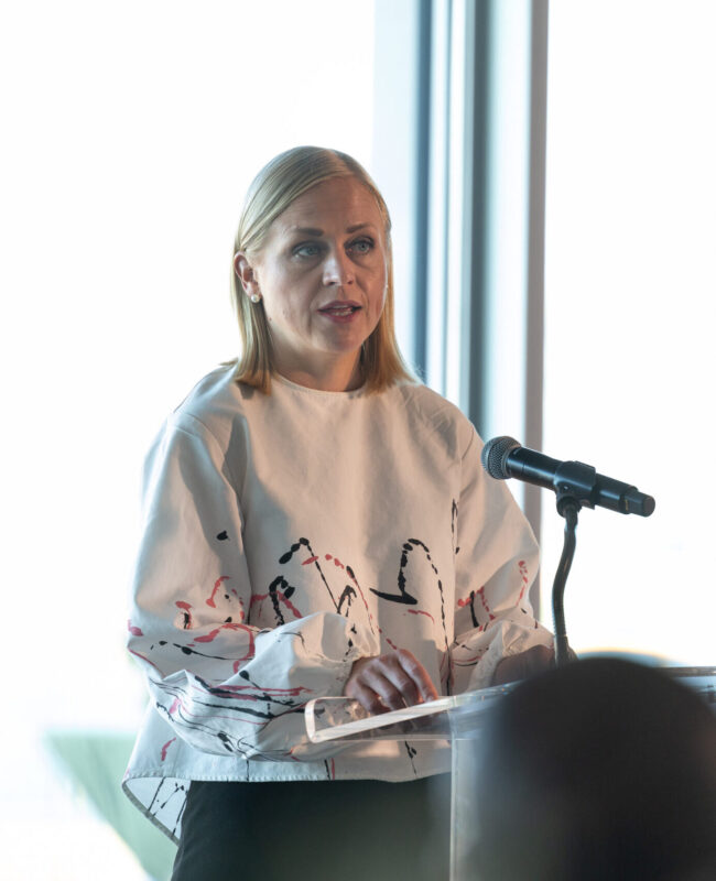 Minister Valtonen giving a speech at the launch event.